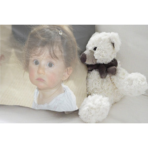 Picture Of Your Child On The Pillow Next To A Doll photo effect