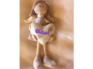 Type your lover's name on the doll and the heart