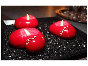 Your lover's name on the candles in the form of hearts