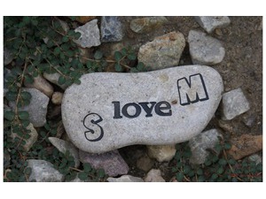 Your lover on a stone and the word love