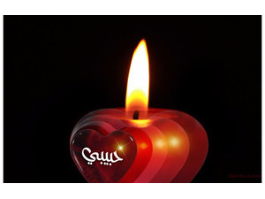 Your lover's name on a heart-shaped candle