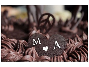 Your lover's name on the heart of chocolate cake