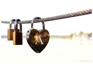 Your lover's name on a heart-shaped lock