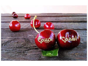A group of red cherry fruits